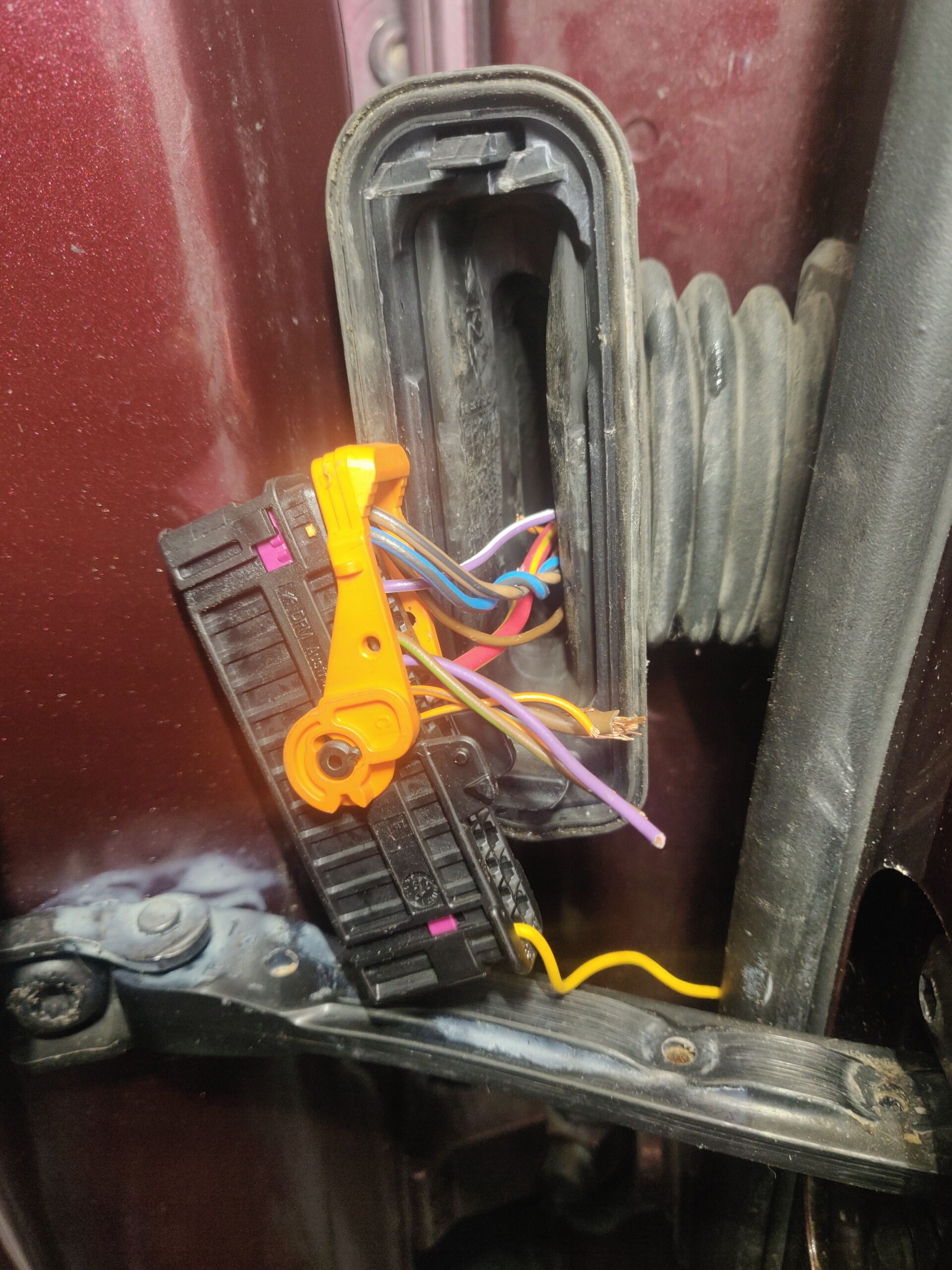 Multiple broken wires in a door loom of a car